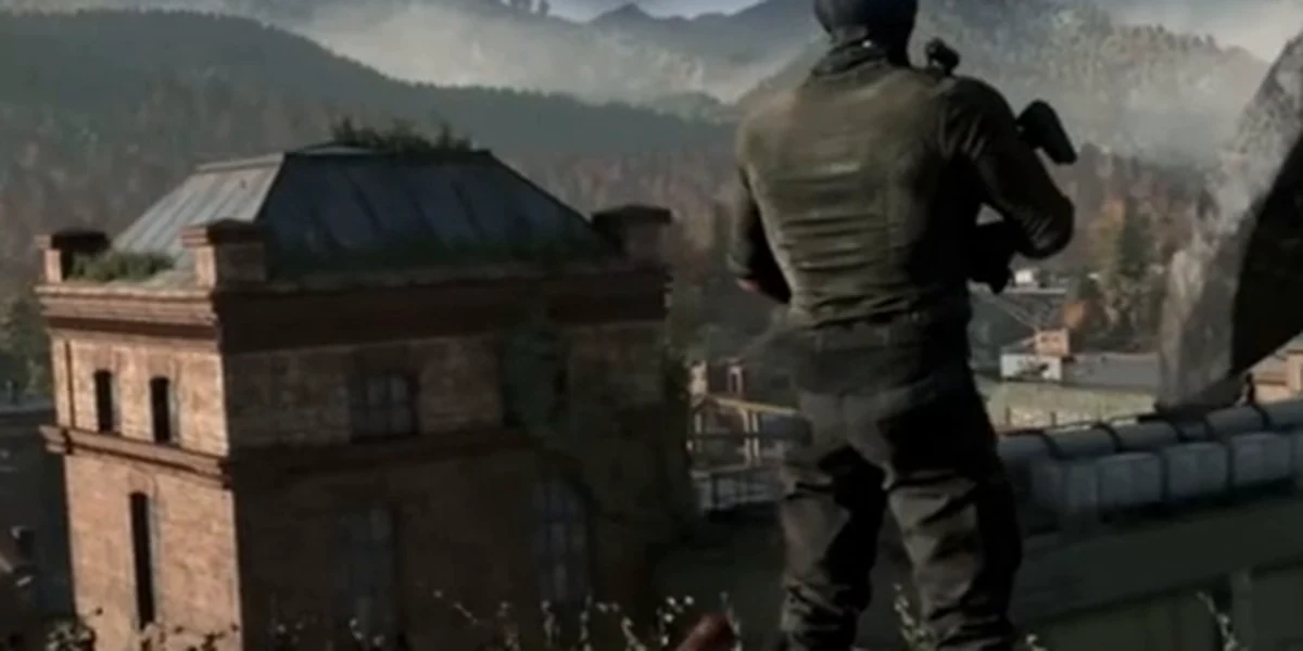 Nhân vật đứng trên mái nhà nhìn ra vùng Castor Woods trong Dying Light: The Beast