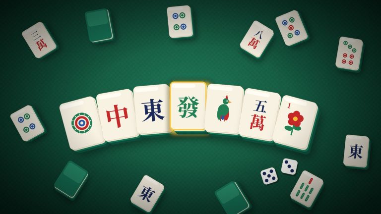 Mahjong tiles arranged on a green felt table with two dice